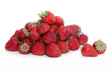 Strawberries on a white background. Strawberry close-up isolated. Juicy berries picked for dessert.