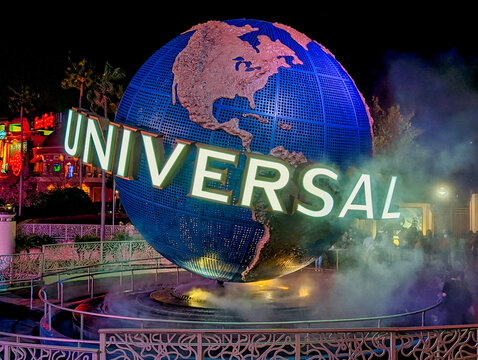 Universal Studios globe at night located at the entrance to the theme park