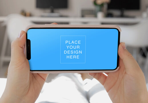 Womans Hand Hold Phone Mockup at Home