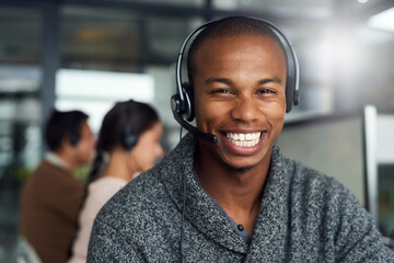 We take a keen interest in finding solutions for you. Portrait of a call centre agent working in an...
