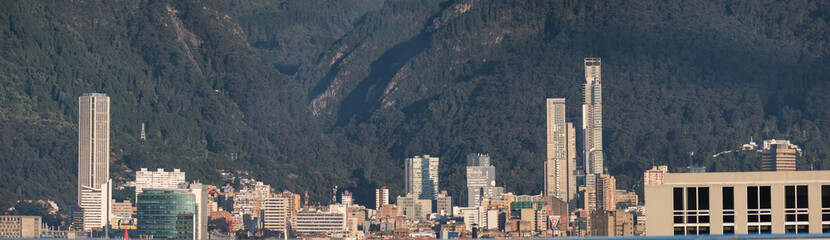 Landscape of high buildings with huge mountains at background in Bogota, Colombia 