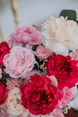 Bouquet of pink peonies a girl for mother's day, valentine's day, Woman's day 8 march. White interior.