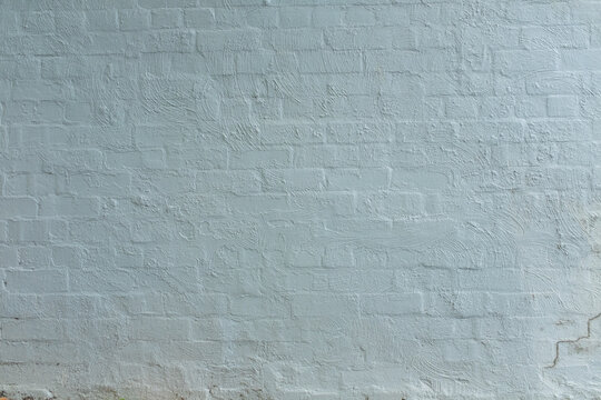 Textured pale green cement rendered exterior wall - background concept