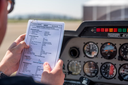 flight preparations in the cockpit with a checklist