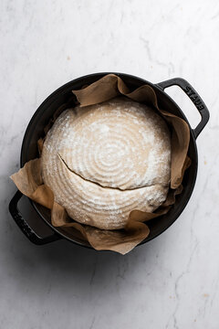 German Sourdough Bauernbrot bread on a marble background