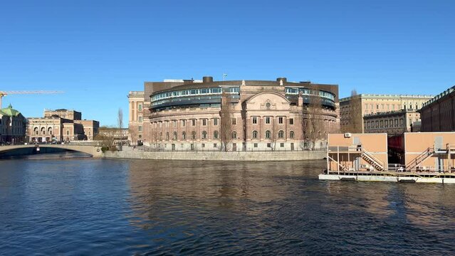 Riksdagshuset or the Parliament House of Sweden. It is located on Helgeandsholmen island in Gamla stan the old town of Stockholm