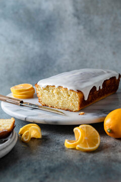 Meyer Lemon Loaf Cake on grey background
