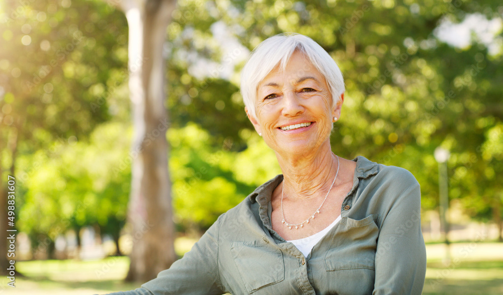 Wall mural the golden years couldnt have turned out better. cropped portrait of a happy senior woman sitting al