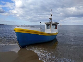 Fishing boat moored to the shore Baltic Sea Sopot
