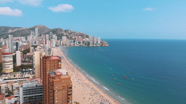 view of the open sea, beach, hills and many buildings and the beauty of the city. High-quality photo