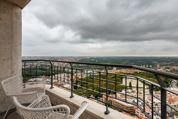 High-rise residential terrace with views of part of the city of Madrid and the park of the country house