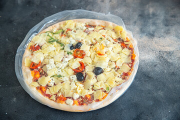 frozen pizza food packaging cling film cellophane quick defrost fresh healthy meal food snack diet on the table copy space food background rustic top view