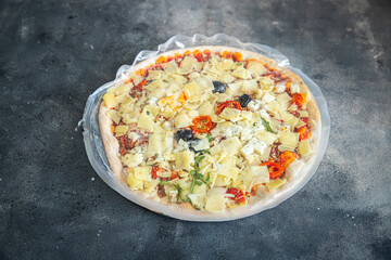 frozen pizza food packaging cling film cellophane quick defrost fresh healthy meal food snack diet on the table copy space food background rustic top view