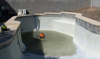 Residential Pool being drained and cleaned 