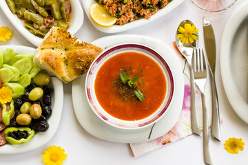 Traditional Turkish Ramadan Dinner,Iftar Table with soup and sliced Ramadan Bread,beginning meal