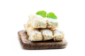 Flaky sweet rolls with cream isolated on white