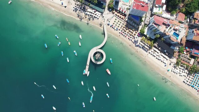 Cenital camera with rotation view of coast and pier [4k] Location: Puerto Vallarta, M&eacute;xico.