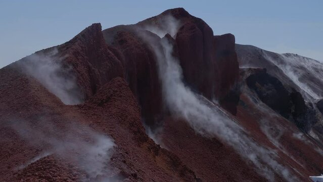 Caldera of Avachinsky stratovolcano, also known as Avacha Volcano. Swinging steam from hot geysers. Kamchatka Peninsula, Russia.
