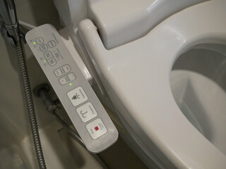 closeup of electric technology toilet bowl in hotel. - obrazy, fototapety, plakaty