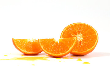 oranges, halved oranges, healthy fruit, mandarin oranges, vitamin C, against white background with refreshing water droplets