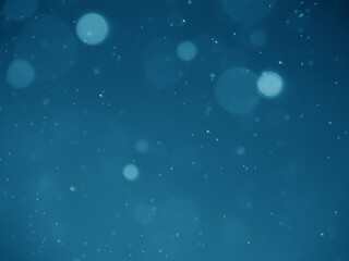 Blue background bokeh. Bokeh pattern from spray. Beautiful, elegant bokeh neon light. Blurred circle bokeh pattern.