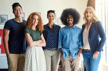 Innovating no matter the task. Portrait of a group of diverse creative employees in a modern office.