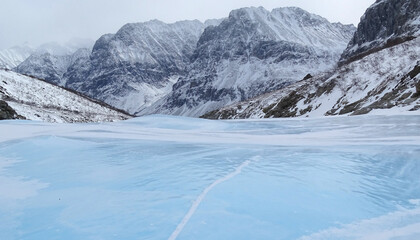 Winter mountain landscape and frozen river, Kodar Ridge, Russia