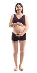 Fototapeta premium Pregnant young woman isolated on white