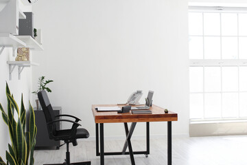 Interior of stylish room with modern workplace