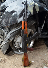 Assault rifle and car wreck in Kiev