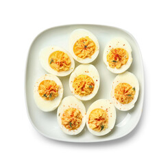 Plate with tasty stuffed eggs on white background. Easter celebration
