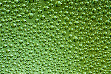 Abstract background of water droplets on the glass surface