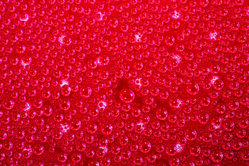 Abstract background of water droplets on the glass surface