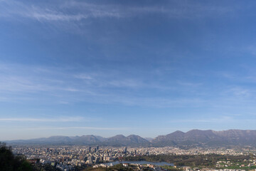 Bly sky over Tirana city, Albania, lake, afternoon