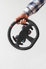 hand holding sport car steering wheel, race pilot isolated simple