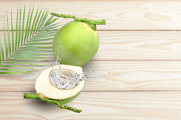  green coconut with coconut juice splash