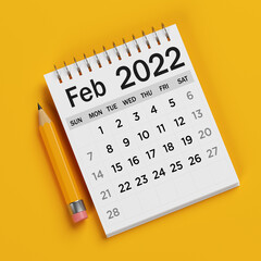White-colored 2022 February calendar. On orange-colored background. Square composition with copy space. Isolated with clipping path.