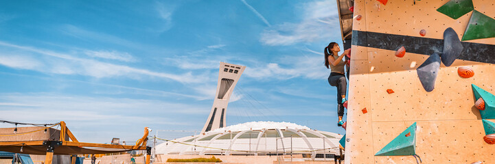 Montreal stadium landscape view from bouldering gym wall outside. Active athlete people climbers training climbing exercise skills panoramic banner. Summer in Quebec, Canada © Maridav