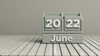 Evergreen fog-colored cubic June 2022 calendar. Horizontal composition with copy space. Focused image.