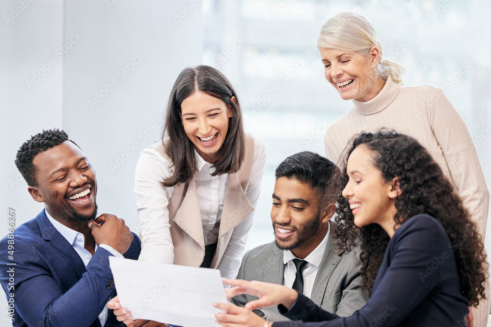 Poster this is such a brilliant idea. shot of a team of business people reading through documents during a 