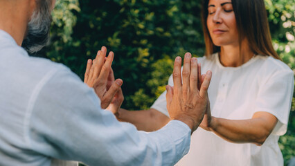 Close-Up of Hands on a Reiki Healing Course