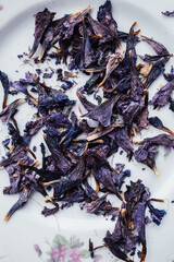 Borage tea flowers on white plate, Gol Gavzaban in Farsi © Nicole Kandi