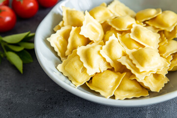 ravioli seafood fish, squid, shellfish, shrimp fresh healthy meal food snack diet on the table copy space food background rustic top view
