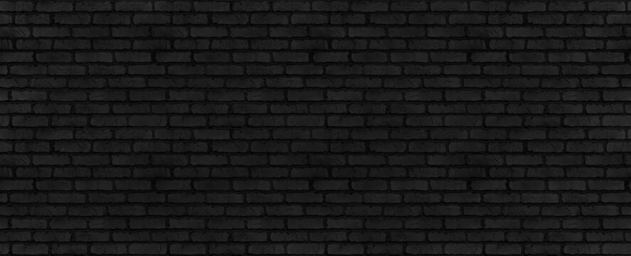 seamless black brick wall pattern or texture