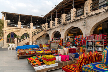 Souq Waqif is a souq in Doha, in the state of Qatar. The souq is known  for selling traditional garments, spices, handicrafts, and souvenirs