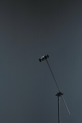 c stand with grey background on a photo studio
