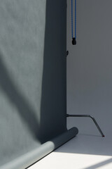 c stand with grey background on a photo studio