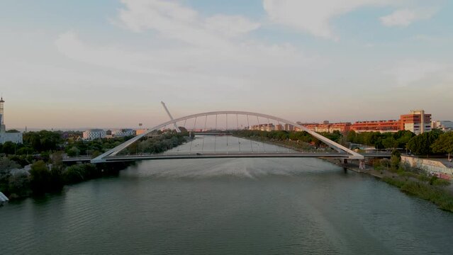 Reverse Shot of Guadalquivir River in Seville with Barqueta and Alamillo Bridges