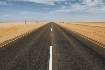Straight surface. Majestic landscaped view of road in Africa, Namibia