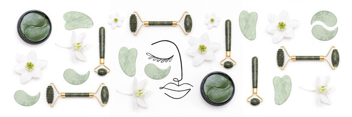 Fototapeta Creative modern selfcare concept. Banner made with surreal woman face and set of cosmetic tools for self-care. Face rollers, massager gua sha scraper, cosmetic collagen patches on white background obraz